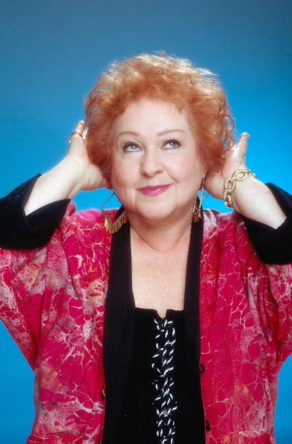 A person with the hand on the head
Description automatically generated with low confidence